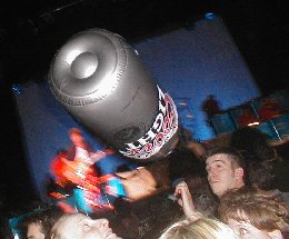 The inflatable beer can on its 32nd lap around the crowd